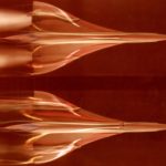 Visualization, in the hydrodynamics tunnel of the l'O.N.E.R.A. (French National Aerospace Research Establishment), of low-speed airflow around the model of a low-incidence supersonic transport. Above: without simulation of the jet engines. Below: with s